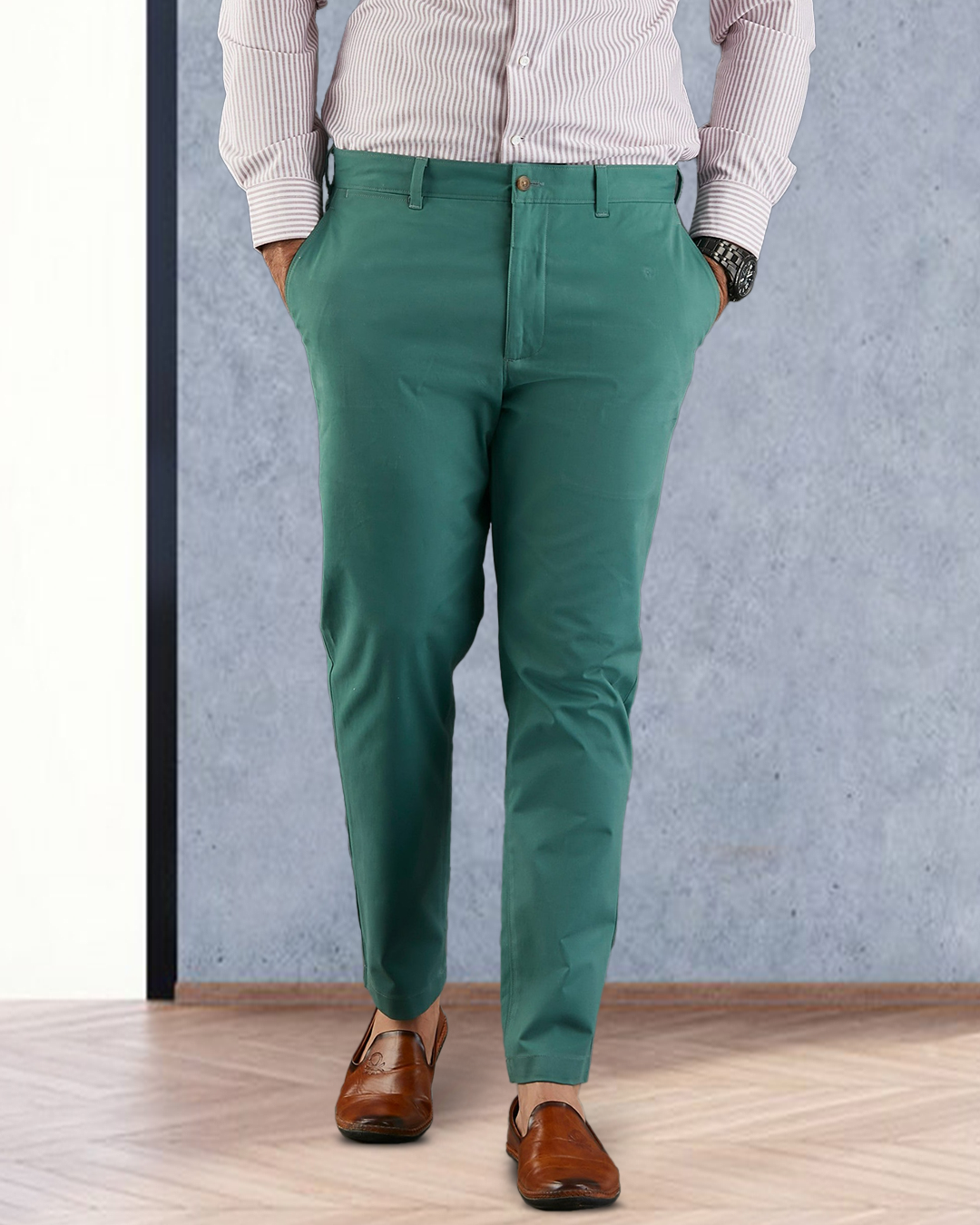 Model close up view of custom Genoa Chino pants for men by Luxire in fern green