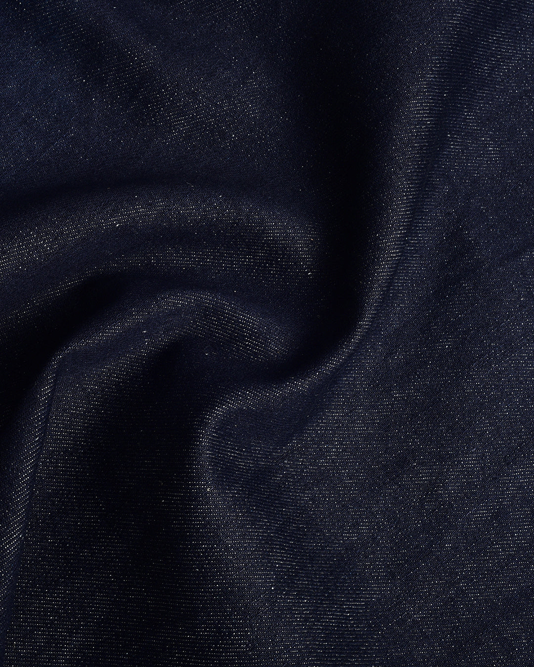 Close up view of custom linen cotton jeans for men by Luxire in indigo 3
